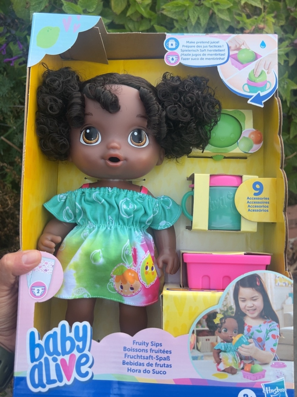 Hasbro Baby Alive Brown Doll in Green Fruit Dress with Pink Accessories